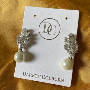 Well made crystal earrings with white Pearl